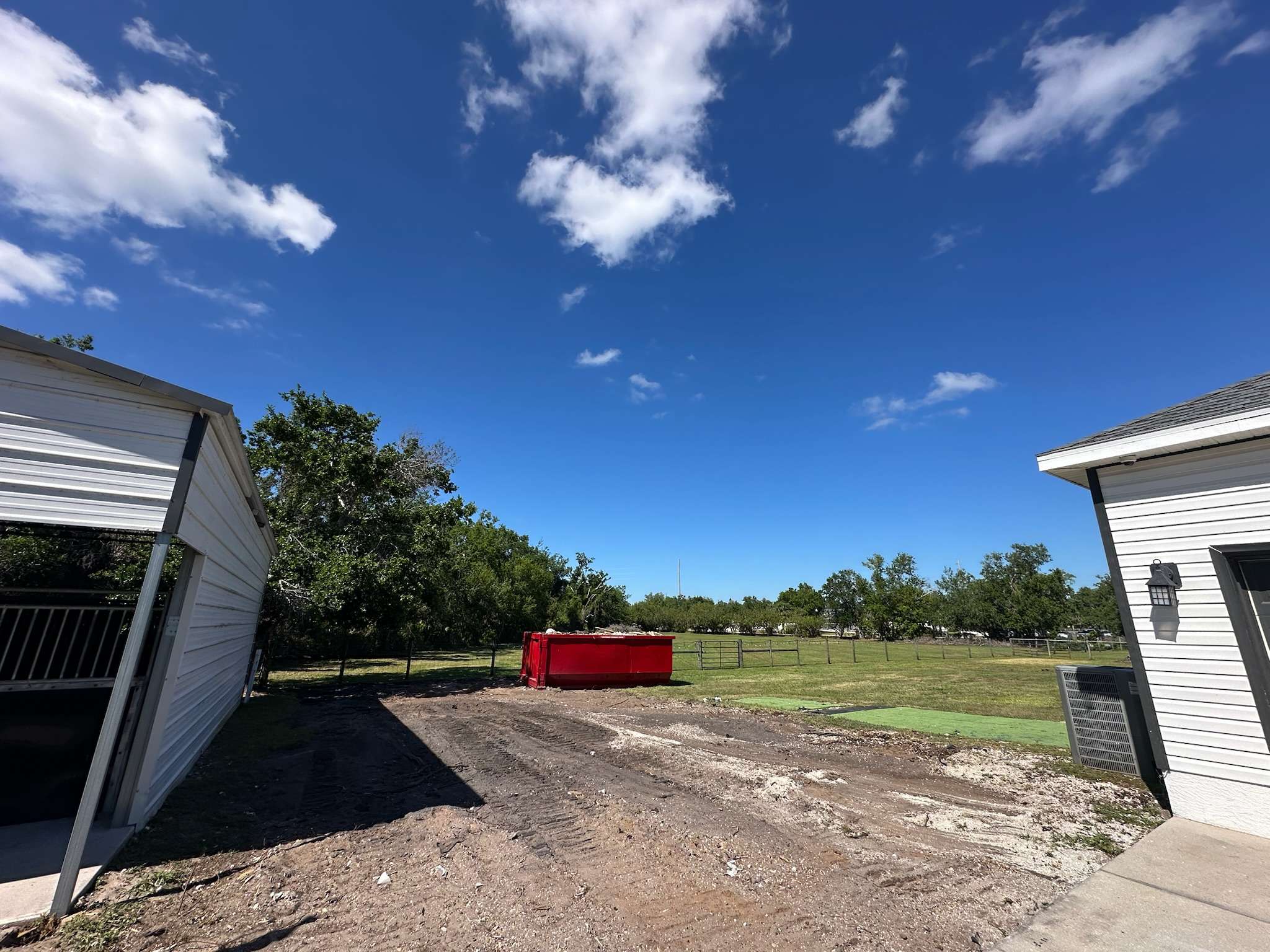 After demolition of an old barn was completed, land was cleared and then graded.