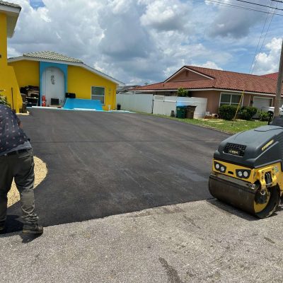 Recently asphalt paved driveway.