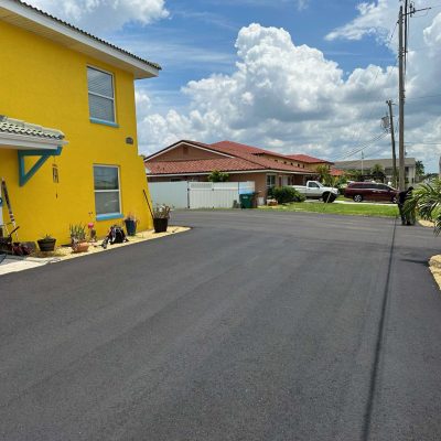 Recently asphalt paved driveway.