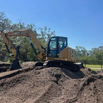 Excavator earthmoving soil in Southwest Florida.