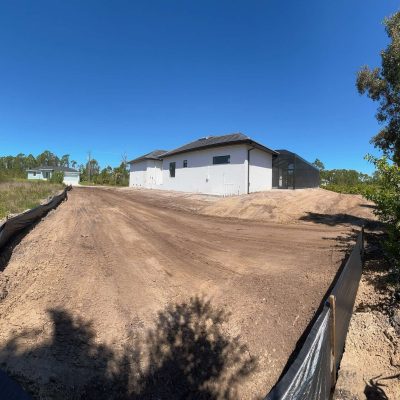 Stucco graded property to ensure ready for stucco and painting.